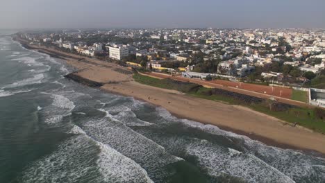Aerial-beach-of-pondycherry-also-known-as-puducherry,-one-of-the-oldest-french-colonies-has-historic-structures
