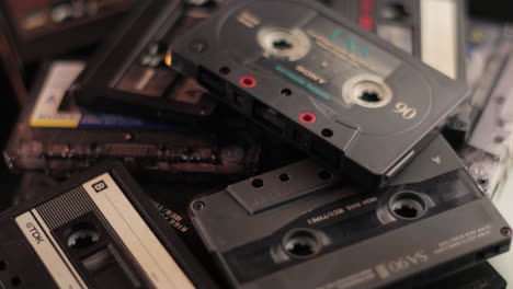 Audio-Cassette-Tapes,-Different-Brands,-Vintage-Sound-and-Music-Recordings-Close-Up-Spinning-Full-Frame