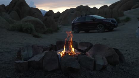 Camping-in-Wilderness,-Car-and-Campfire-in-Twilight,-Slow-Motion