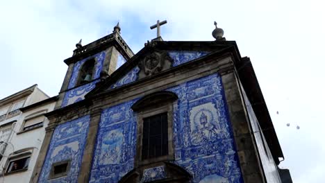 Crowded-Chapel-of-Souls-exterior-main-entrance-covered-with-blue-and-white-tiles