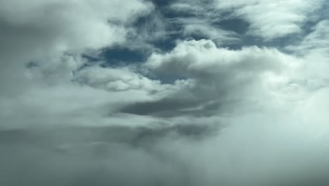 Cloudscape-POV,-pilot-perspective-shot-in-a-real-time-flight-across-a-partially-clouded-sky