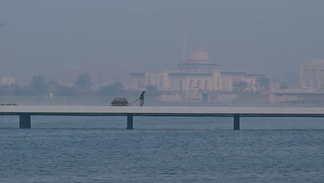 On-February-24,-2024,-A-misty-winter-morning-along-the-coastline-of-Sharjah-in-the-United-Arab-Emirates