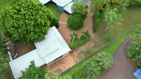 Aerial-drone-of-Rural-Prestigous-Tropical-Style-Home-Pan-Around-Above-Driveway-surrounded-by-forest