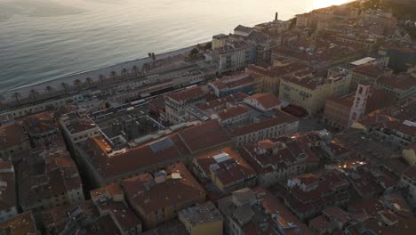 Aerial-View-of-Mediterannean-Sea-and-French-City-at-Sunset