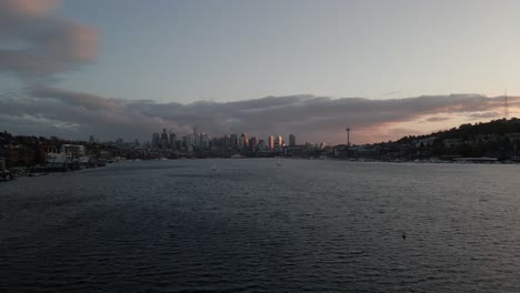 Aerial-shot-over-Lake-Union-revealing-the-Seattle-Skyline-at-sunset