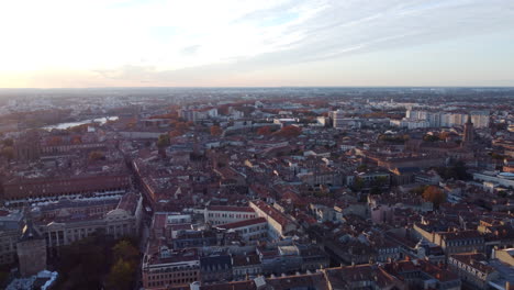 Aerial-View-Of-Toulouse-City-At-Sunrise-In-Occitania,-Haute-Garonne,-France