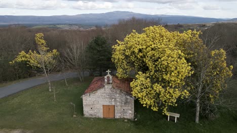 Pullback-aerial-establish-of-Chapel-of-San-Vitoiro-on-hilltop
