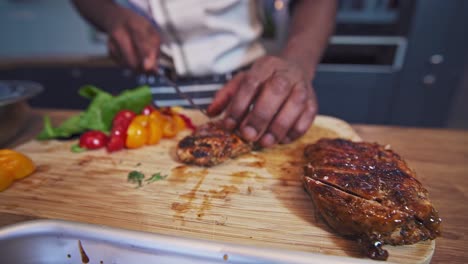 Jamaican-jerked-chicken-being-sliced