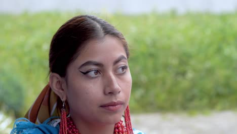 latina-woman-looking-from-side-to-side-and-then-smiling-at-the-camera