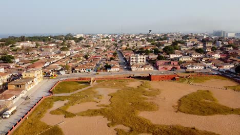 Muslim-praying-ground-at-King-Fahad-Mosque-in-Banjul,-Gambia---West-Africa-aerial-panoramic-view-day-time
