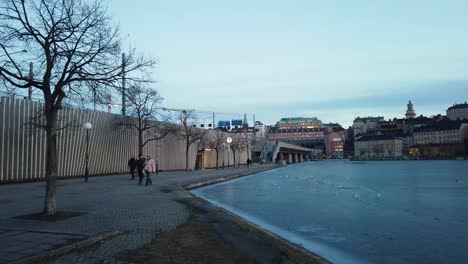 Slowly-walking-towards-Gamla-Stan-subway-entrance-in-Stockholm,-Sweden