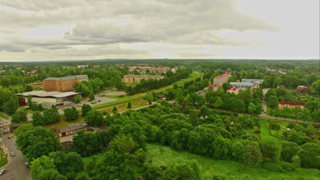 Drone-aerial-dolly-forward-shot-of-Cesis-Latvia-skyline-on-a-cloudy-day