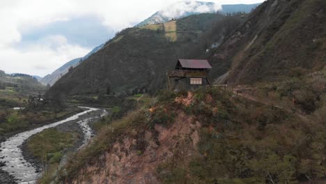 Aerial-view-of-the-viewpoint-on-top-of-a-hill-on-the-waterfall-route-in-Cotalo,-Ecuador