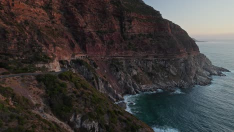 Scenic-View-Of-Chapman's-Peak-Drive-During-Sunset-In-Cape-Town,-South-Africa---Drone-Shot