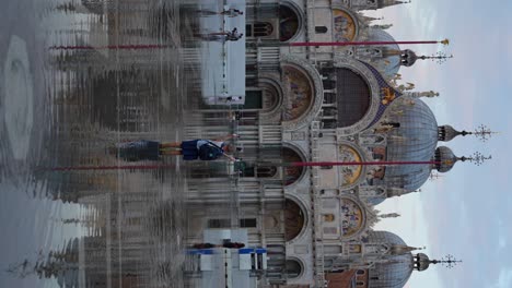 Mother-and-son-standing-in-flooded-St