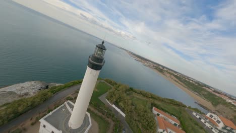 Drone-flying-around-Biarritz-Lighthouse,-France