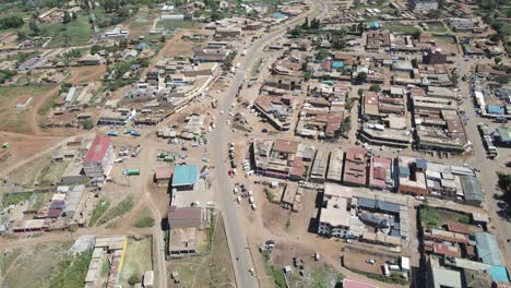Poor-African-town-simple-architecture-and-buildings-aerial-panorama,-Kenya