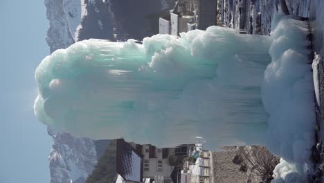 Close-up-of-an-ice-column-with-small-dripping-icicles-in-St