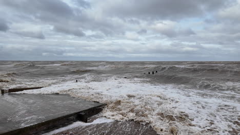 Storms,-gale-force-winds-and-high-tides-from-the-North-Sea-batter-the-English-coast-at-Seasalter,-Nr-Whitstable-on-the-Kent-coast-of-England-on-February-26th,-2024