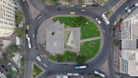 Karaiskaki-Square-in-Metaxourgeio,-Athens-from-above-with-traffic
