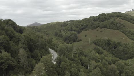 Panoramic-mountain-road-crossing-Roncesvalles-or-Ronceval-or-Roncevaux-Pass,-Pyrenees,-Spain