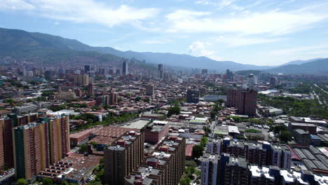 Aerial-View-of-Medellin,-Colombia,-North-Residential-Districts-With-Downtown-in-Misty-Skyline,-Drone-Shot