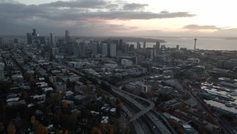 Aerial-establishing-shot-of-the-Seattle-Skyline-under-moody-lighting