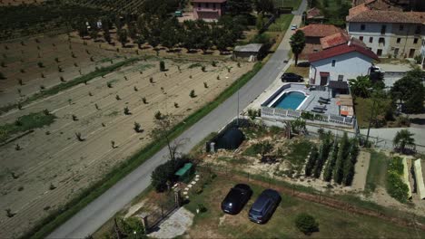 Aerial-view-of-a-rural-house-and-path-in-a-typical-Italian-landscape