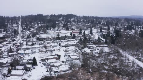 Aerial-shot-showing-snow-in-suburban-oregon-town