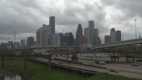 Moving-away-drone-shot-of-downtown-Houston,-Texas