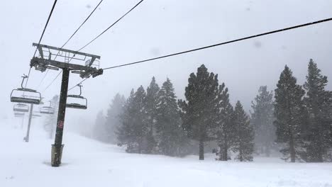 Ski-Lifts-in-a-Thick-Sierra-Blizzard,-Mammoth-California