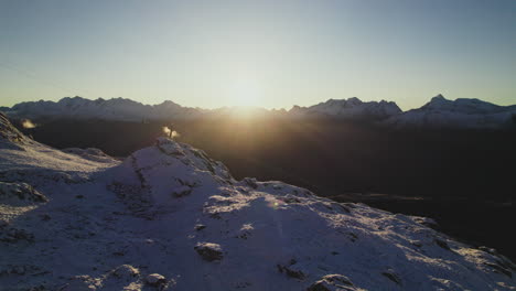 Swiss-Alps-at-Sunrise,-Snow-Topped-Mountain-Summit-Scenery-at-Aletsch-Arena-Ski-Area-in-Valais-Canton-Region,-Switzerland