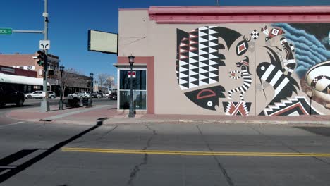 Downtown-Deming,-New-Mexico-showing-mural-and-intersection-with-video-panning-right-to-left