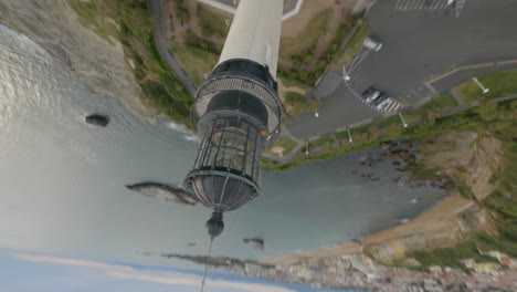 Crazy-drone-flying-over-Biarritz-Lighthouse,-France
