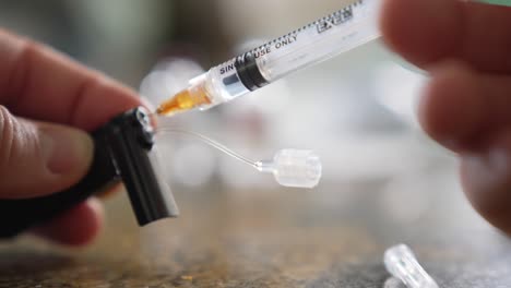 Preparing-Insulin-Shot,-Close-Up-of-Pump-and-Syringe,-Diabetes-Treatment-Concept