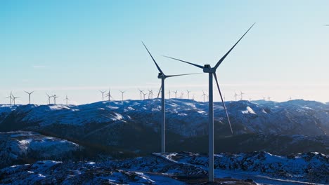 Wind-Turbines-In-Snowy-Norwegian-Landscape-In-Bessaker---Wide-Shot