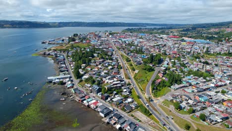 Aerial-overview-of-the-cityscape-of-Castro-city,-sunny-day-in-Chiloe,-Chile