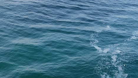 Ocean-Water-Surface-With-Blue-Sea-Ripples-And-Waves---Aerial-Drone-Shot