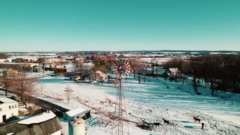 Weather-Windmill-in-Snowy-Rural-Landscape