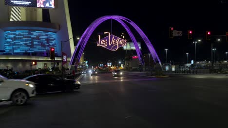 Purple-neon-Gateway-Arches-sign-welcomes-tourists-to-Las-Vegas-downtown