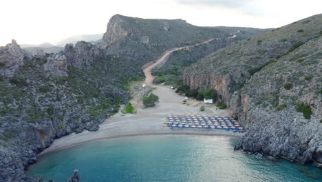 Aerial-view-of-the-famous-rocky-beach-Chalkos-in-Kythera,-Greece,-at-sunset