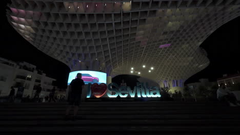 I-love-Sevilla-sign-Setas-landmark-in-Seville-Spain-at-night-touristic-spot