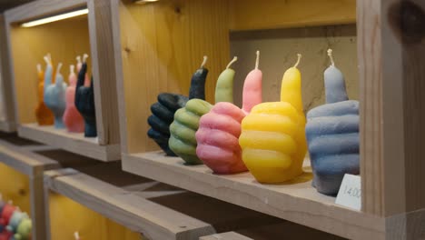 Colorful-Thumbs-Up-Hand-Candles-on-Display,-La-Candela-store,-Venice