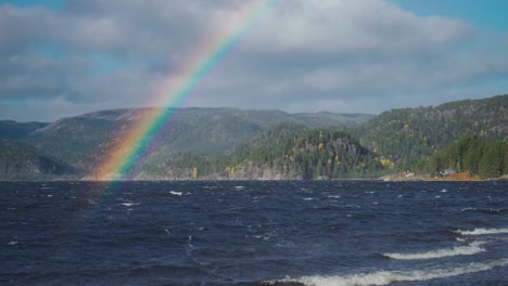 A-rainbow-hangs-above-the-stormy-waters
