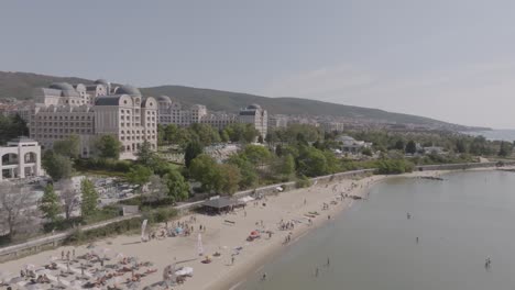 Drone-shot-of-a-hotel-next-to-the-beach