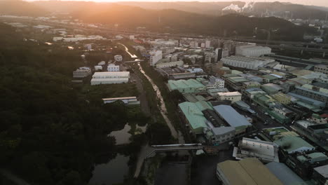 Aerial-View-Of-Luzhu-District-At-Sunset-In-Taoyuan-City,-Taiwan