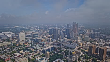 Atlanta-Georgia-Aerial-v969-hyperlapse-drone-flyover-Capital-Gateway-capturing-downtown-skyline-in-dense-fog-with-sunlight-peeking-through-fast-moving-clouds---Shot-with-Mavic-3-Pro-Cine---August-2023