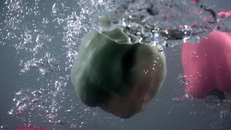 Vegetables-paprikas-underwater-super-slow-motion
