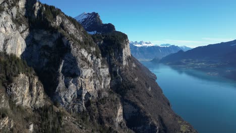 Amden-Weesen-Switzerland-flight-towards-cliffs-over-colourful-and-famous-lake