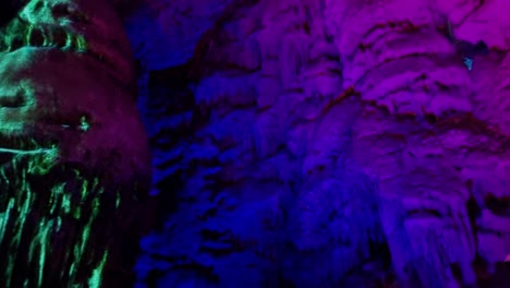 Multicolored-illuminated-stalactites-inside-St